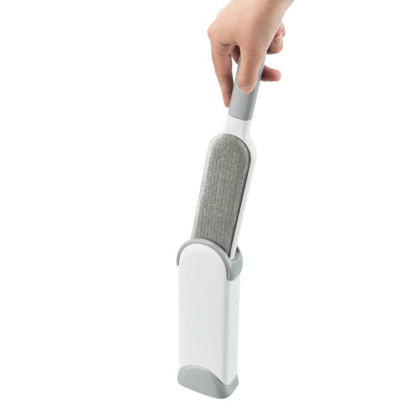 Brosse à peluches avec station de nettoyage