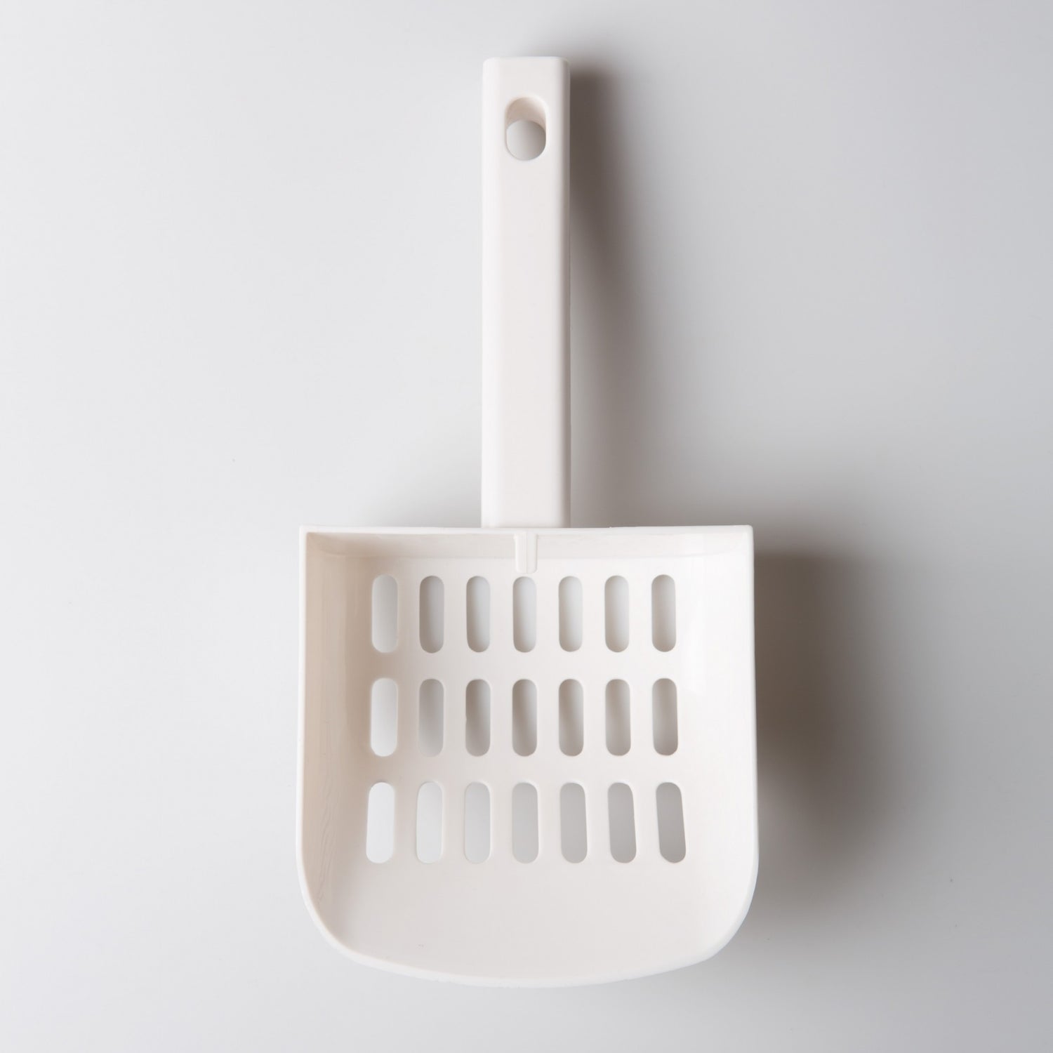 Pelle à litière avec support