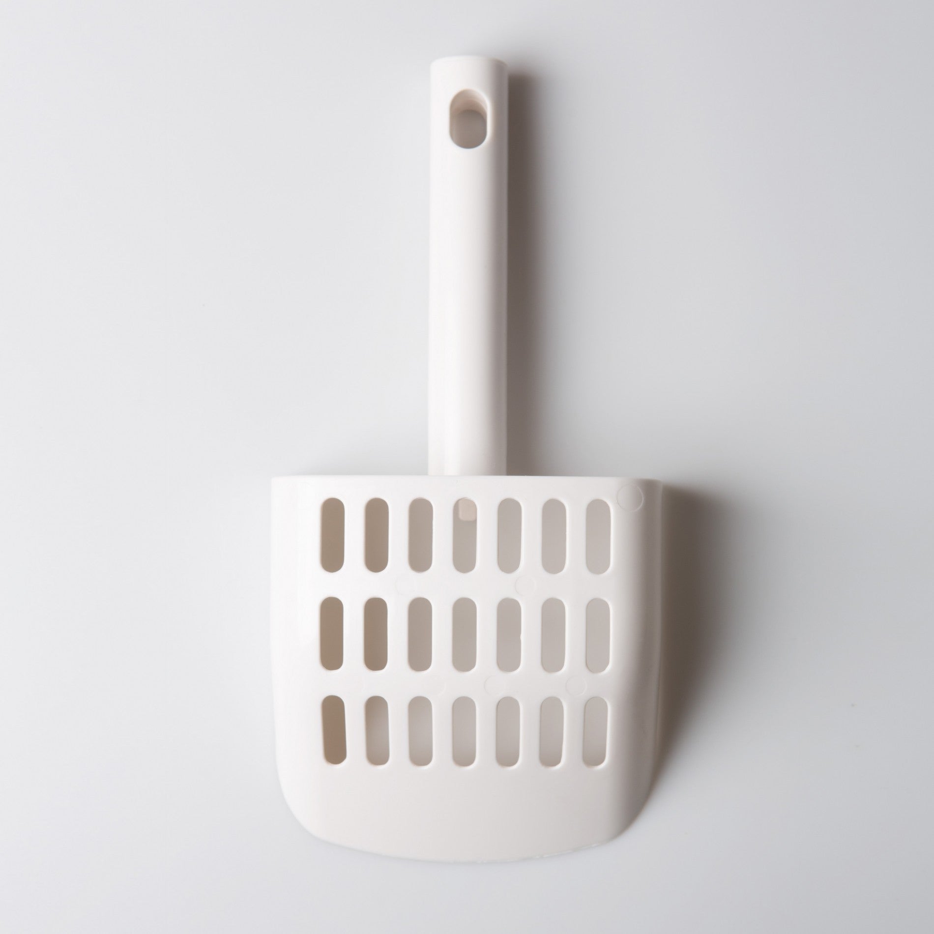 Pelle à litière avec support