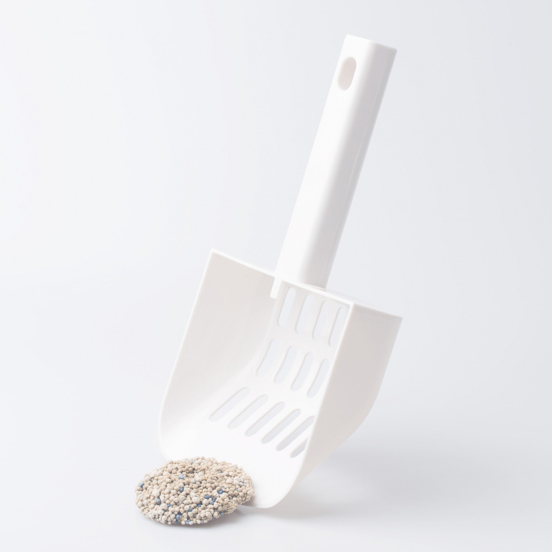 Pelle à litière avec support