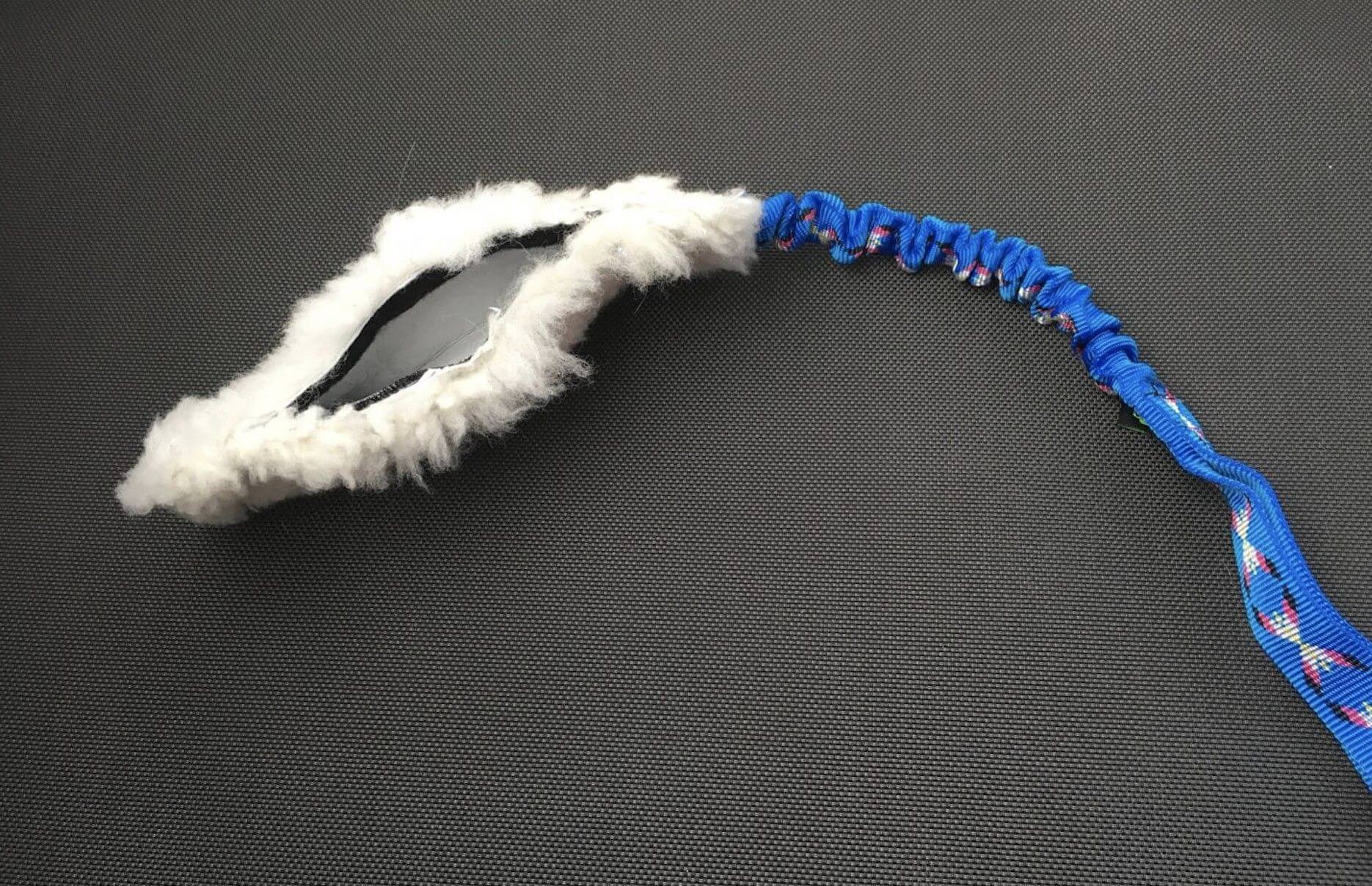 JOUET POCHETTE A FOURRURE MERINO